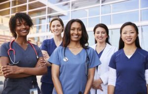 female travel nurses in group smiling