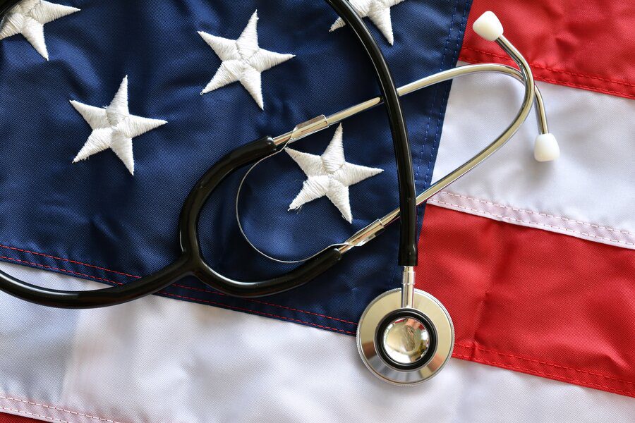 American healthcare concept-flag and stethoscope