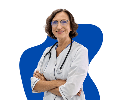 Female doctor standing with arms crossed smiling