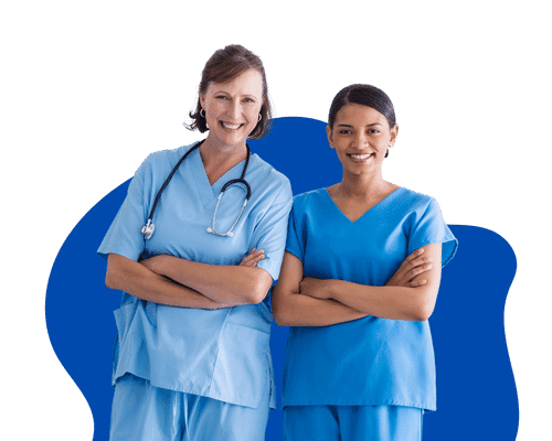 Two nurses standing together smiling