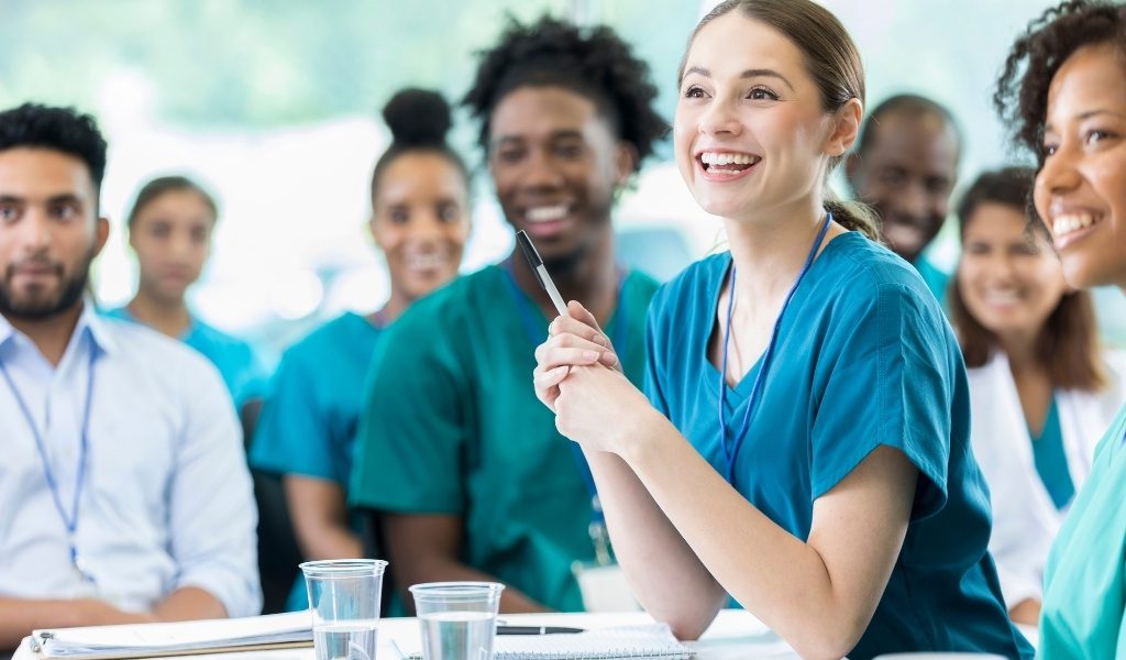 Portrait of a pair of travel nurses talking and smiling
